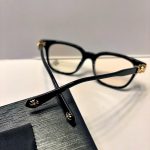 Gold Chrome Y2K Style Crossed Glasses - Image 2