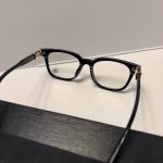 Gold Chrome Y2K Style Crossed Glasses - Image 4