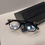 Gold Chrome Y2K Style Crossed Glasses - Image 5