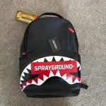 Black and red Sprayground backpack